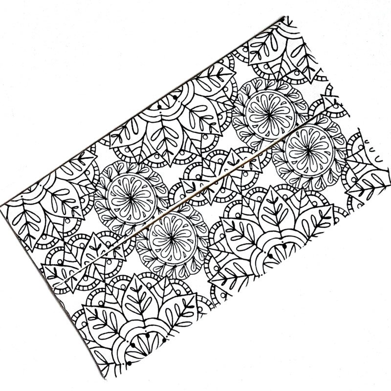textile flat rectangular pouch to hold facial tissues in graphic black and white floral pattern