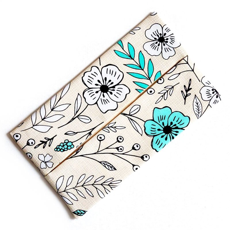 rectangular full size pouch for facial tissues made from cotton in the cream teal white black floral pattern