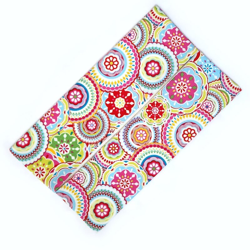 flat rectangular pouch made from birght floral fabric for facial tissues